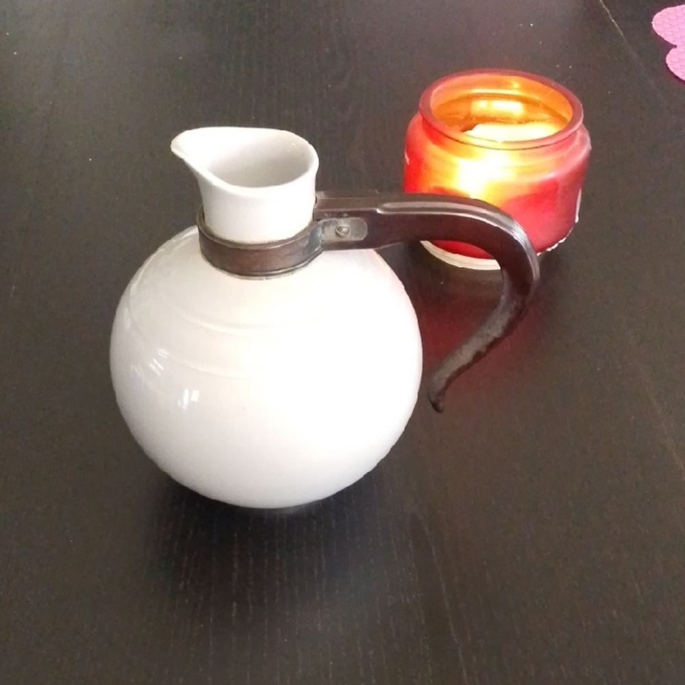 Elegant White Ceramic Pitcher
